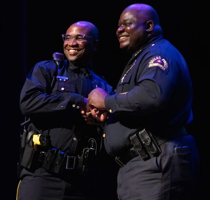 Police Officer Jeremy Guillory, left, poses for a photo while receiving his Police badge...