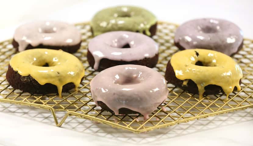 Doughnuts are topped with a glaze made with natural food coloring.