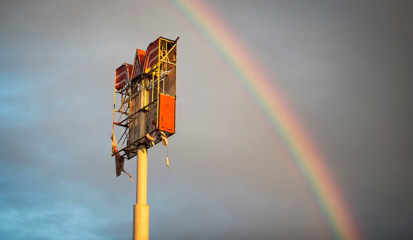 A rainbow appears over over a Whataburger sign that was destroyed by Hurricane Harvey in...