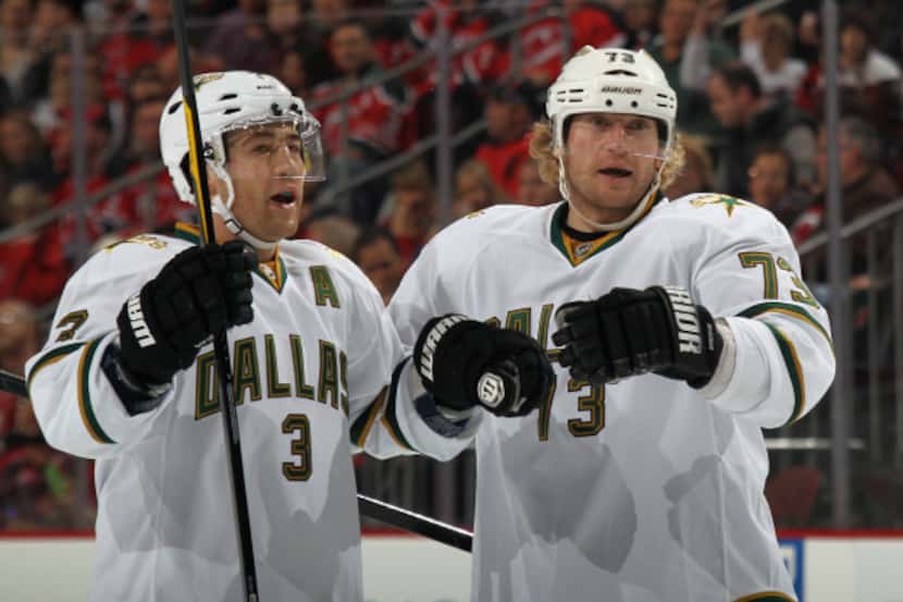 Michael Ryder (right) of Dallas scores at 8:40 of the first period against New Jersey and is...