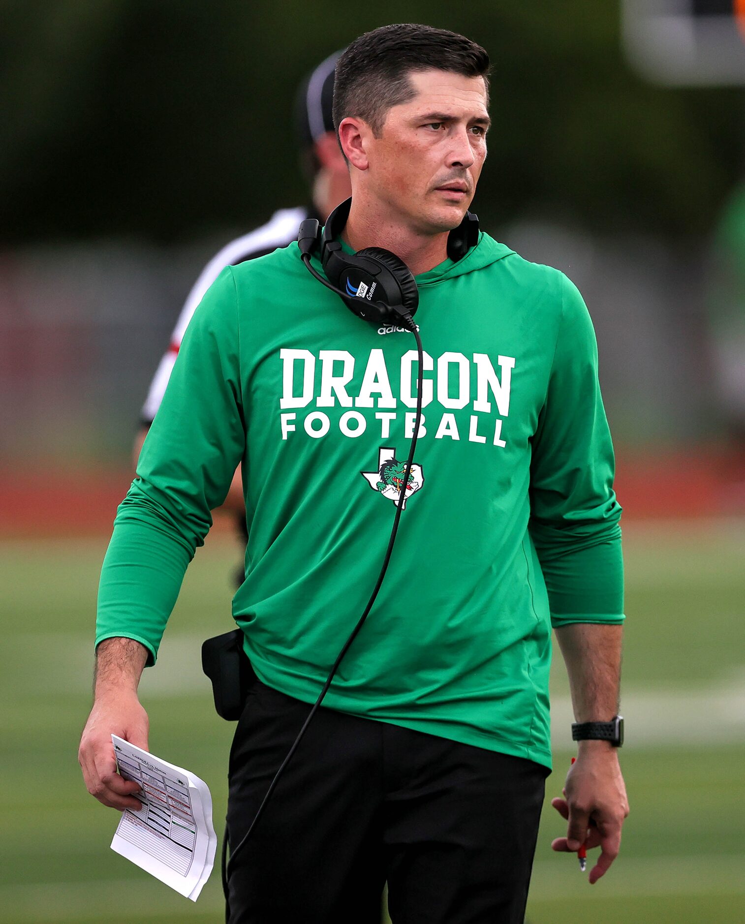 Southlake Carroll head coach Riley Dodge walks the sideline against Flower Mound Marcus...