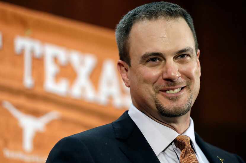 This Nov. 27, 2016, file photo shows Tom Herman talking to the media during a news...