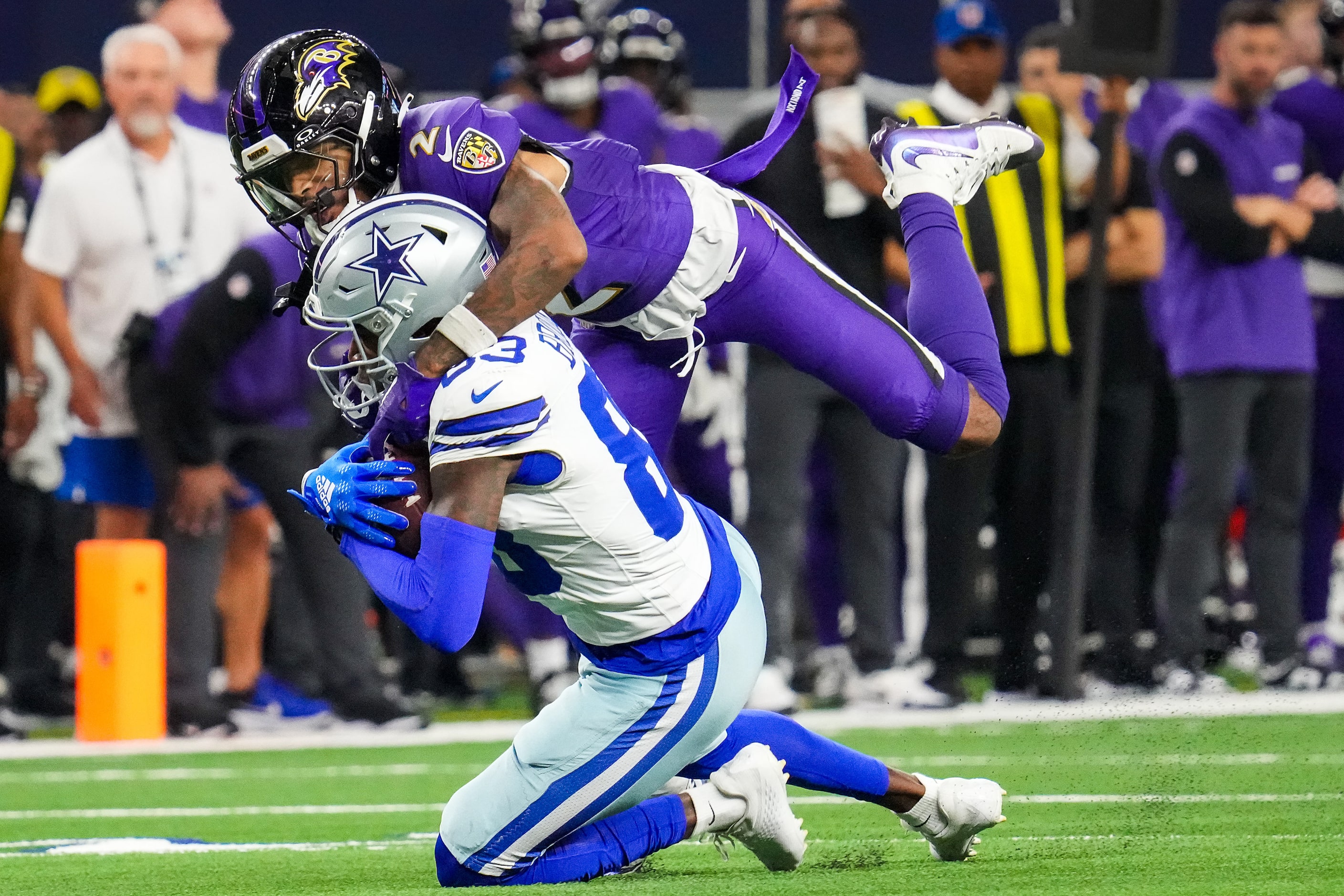 Dallas Cowboys wide receiver Jalen Brooks (83) makes a catch as Baltimore Ravens cornerback...