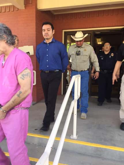Chris Estrada (center in blue shirt) was sentenced Friday, July, 12, 2019, to 3 1/2 years in...