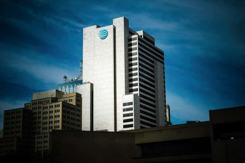 FILE -- The AT&T corporate headquarters building in downtown Dallas, Nov. 21, 2017. A...