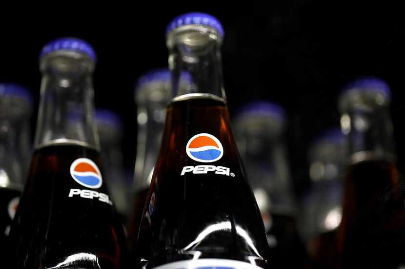 SAN RAFAEL, CA - JULY 11:  Bottles of Pepsi soda are displayed on a shelf at Santa Venetia...