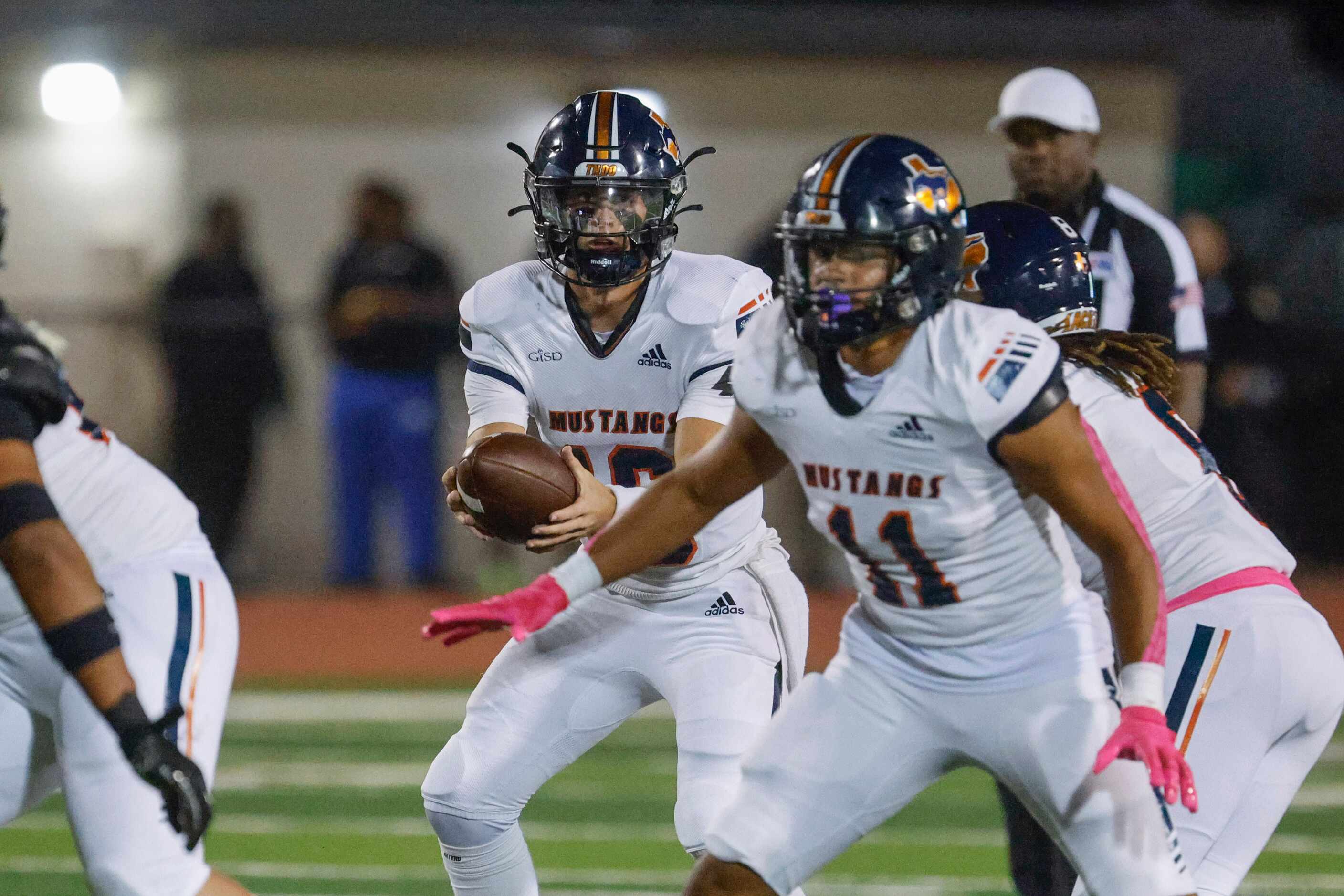 Sachse high school’s QB Brenden George passes the ball against Garland High School during...