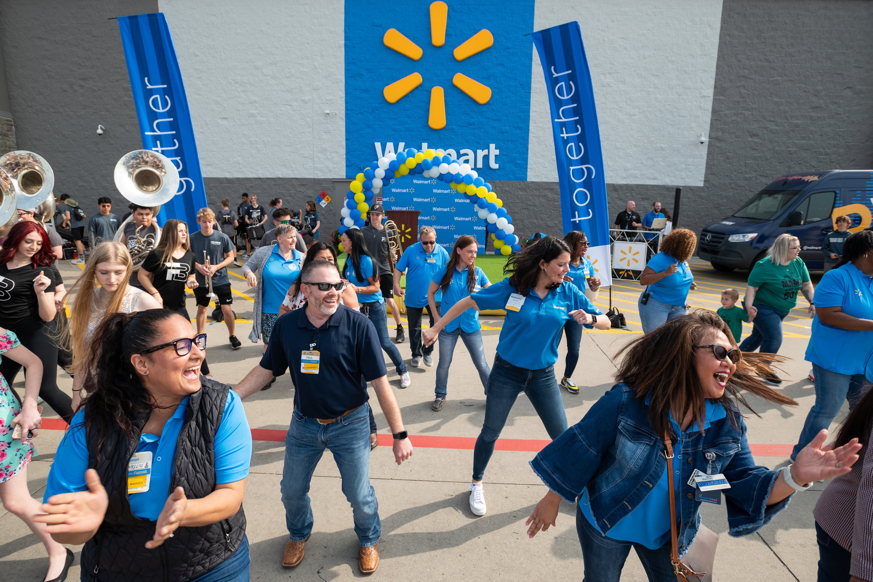 Walmart staff welcomes customers to remodeled Richardson location