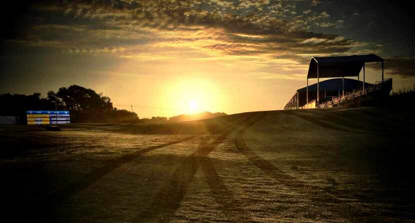 The sun rises over Trinity Forest Golf Club on May 17, before the start of the first round...