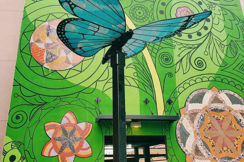 One of eight steel butterfly sculptures placed around the downtown McKinney area is shown....