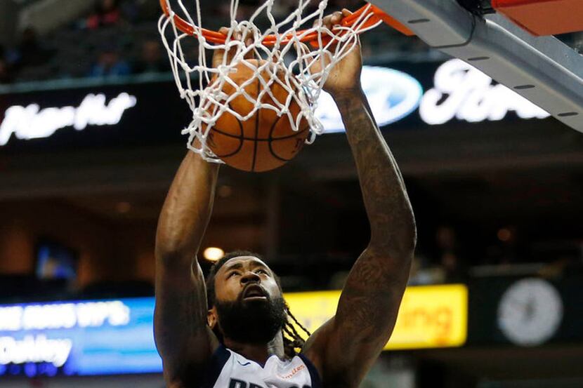Dallas Mavericks center DeAndre Jordan (6) dunks in front of Charlotte Hornets center Willy...