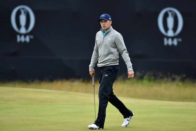 US golfer Jordan Spieth walks from the 6th green after making a birdie during his final...