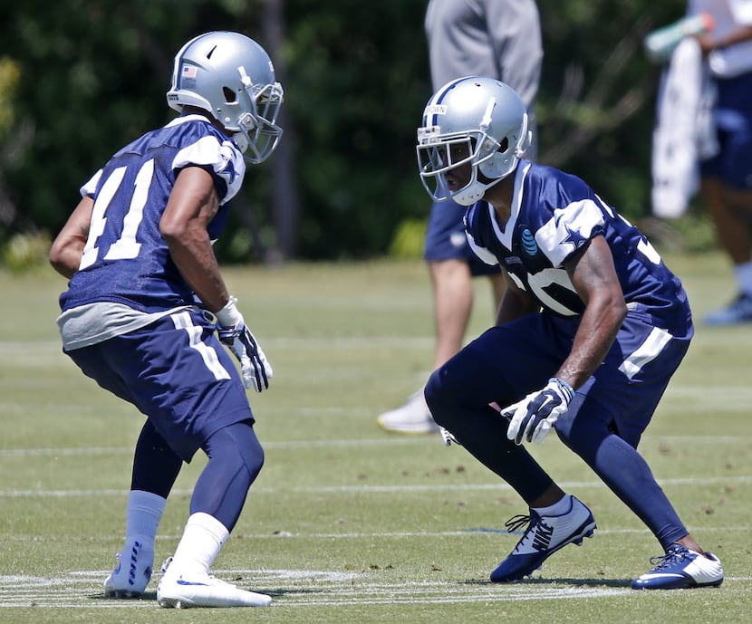 Cowboys rookie cornerback Anthony Brown (30) practices with Arjen Colquhoun during the...