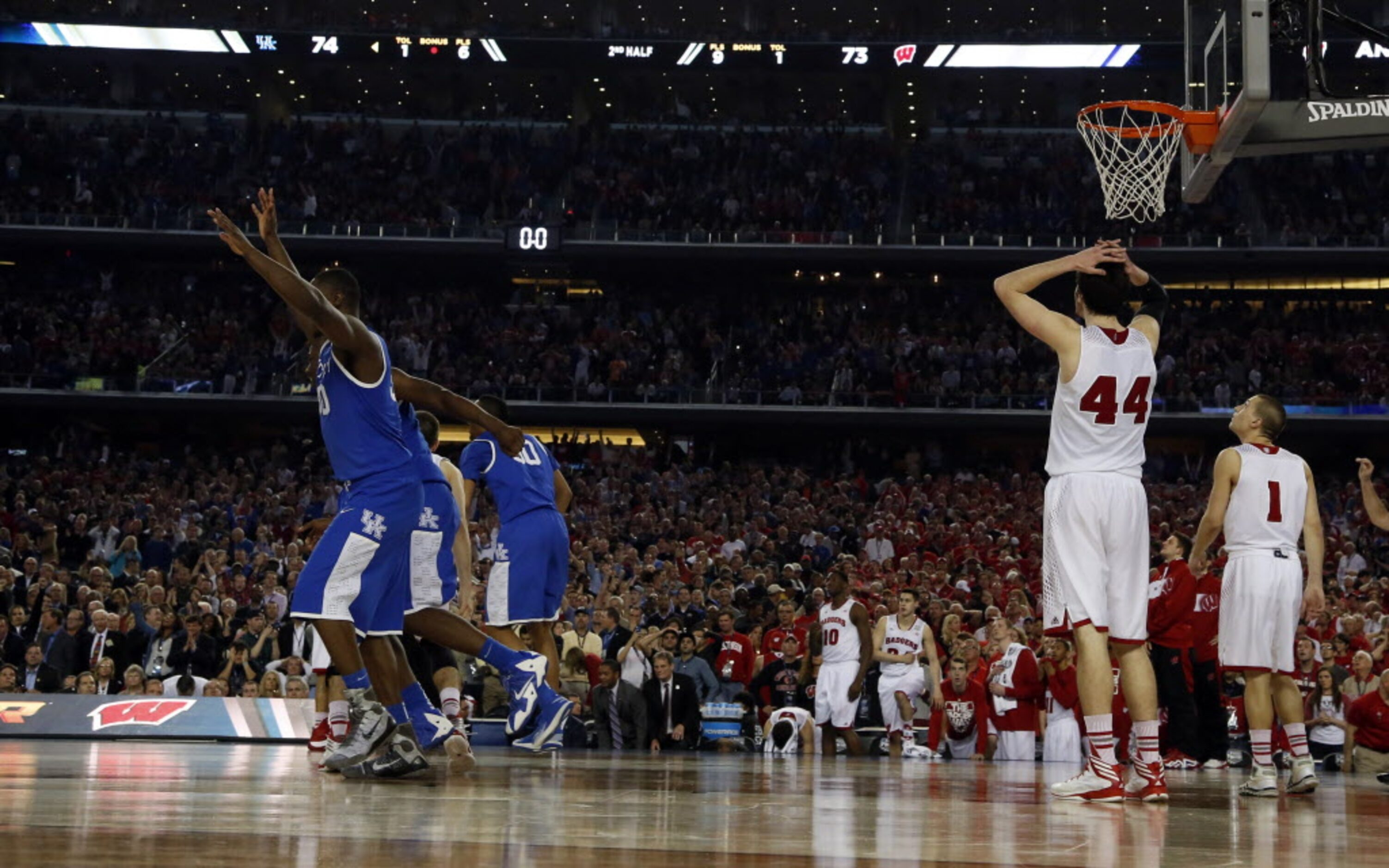 Kentucky Wildcats celebrates after a last second shot from Wisconsin Badgers guard Traevon...