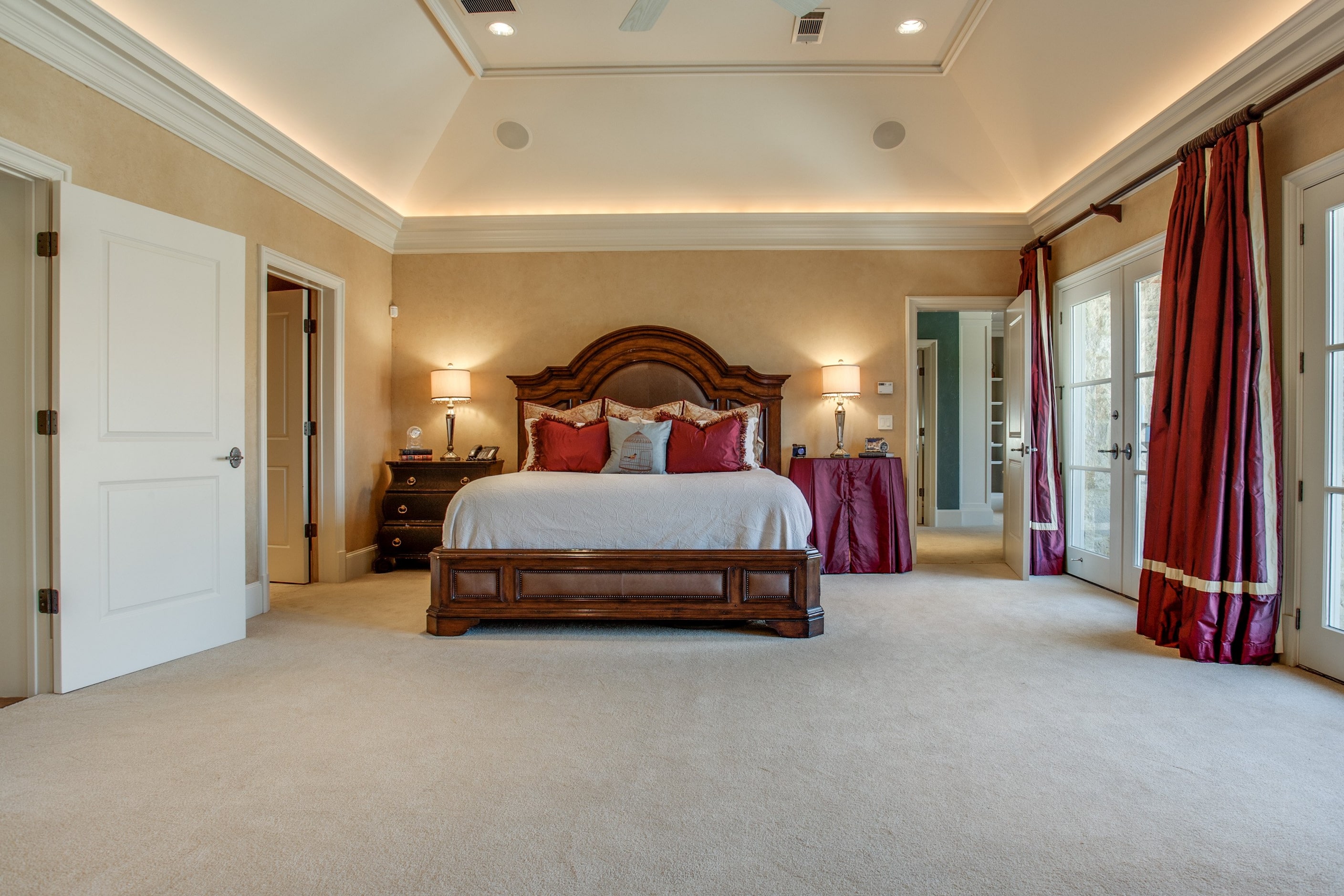 The breakfast nook and kitchen feature neutral granite, antique white cabinetry, center...