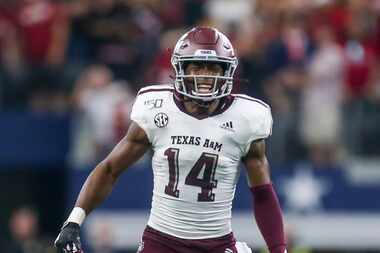 Texas A&M Aggies defensive back Keldrick Carper (14) celebrates after stopping Arkansas...