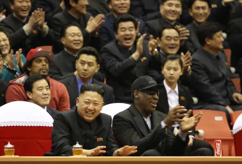 North Korean leader Kim Jong Un and former NBA star Dennis Rodman watch North Korean and...
