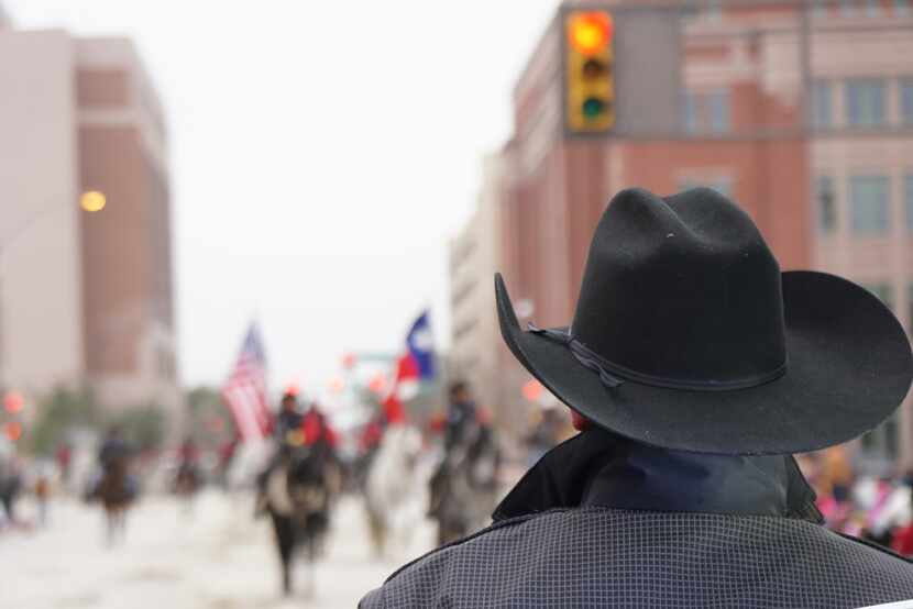 A Fort Worth police officer looks on during the Fort Worth Stock Show's "All Western Parade"...