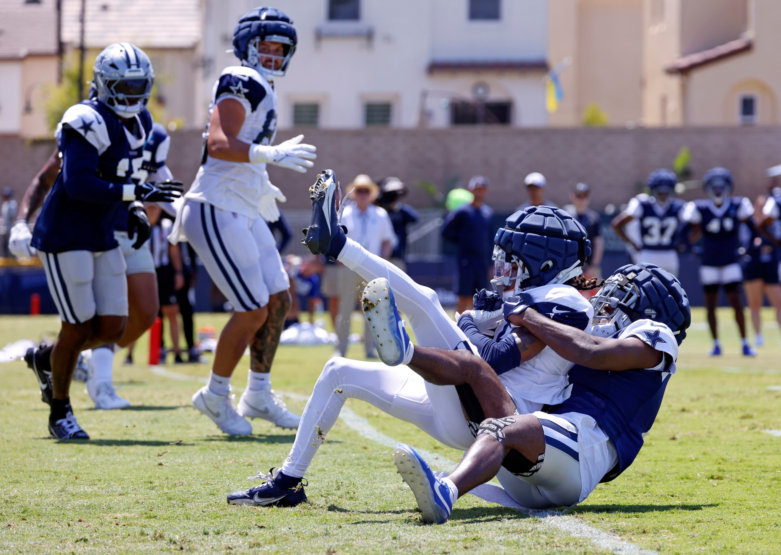 Dallas Cowboys wide receiver KaVontae Turpin (9) catches a touchdown pass in the end zone as...