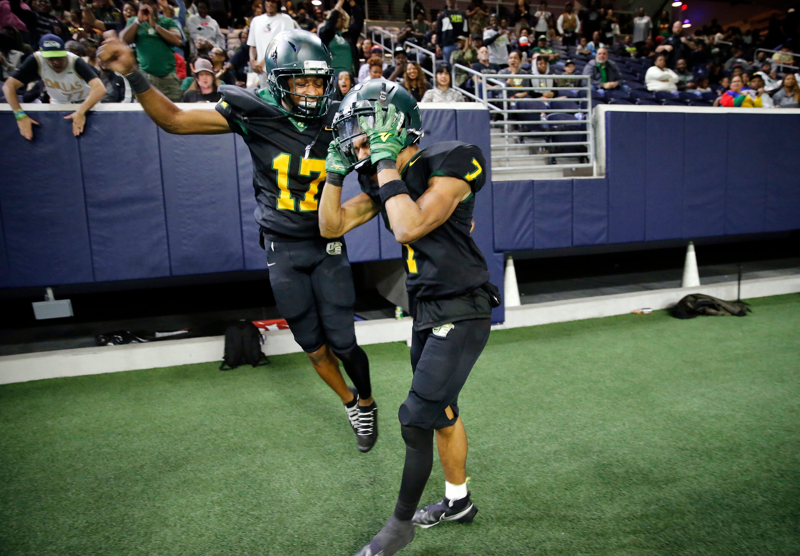 DeSoto free safety Jeshan McCoy (17) celebrates Jamarion Ravenell’s (7) fumble recovery...