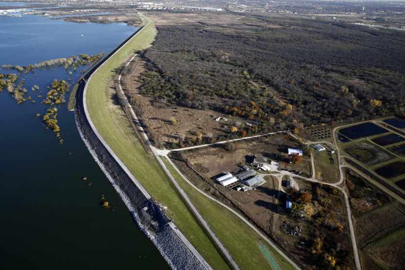 File photo shows an aerial view of the Lewisville Lake dam.