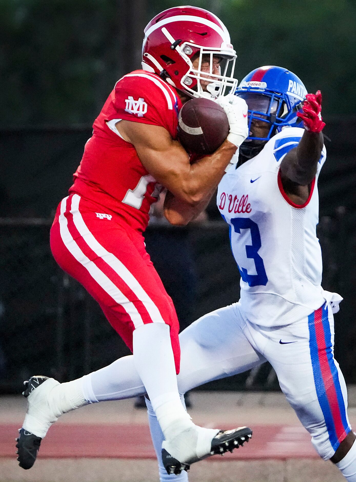 Mater Dei defensive back Joshua Hunter (14) intercepts a pass in the end zone intended for...