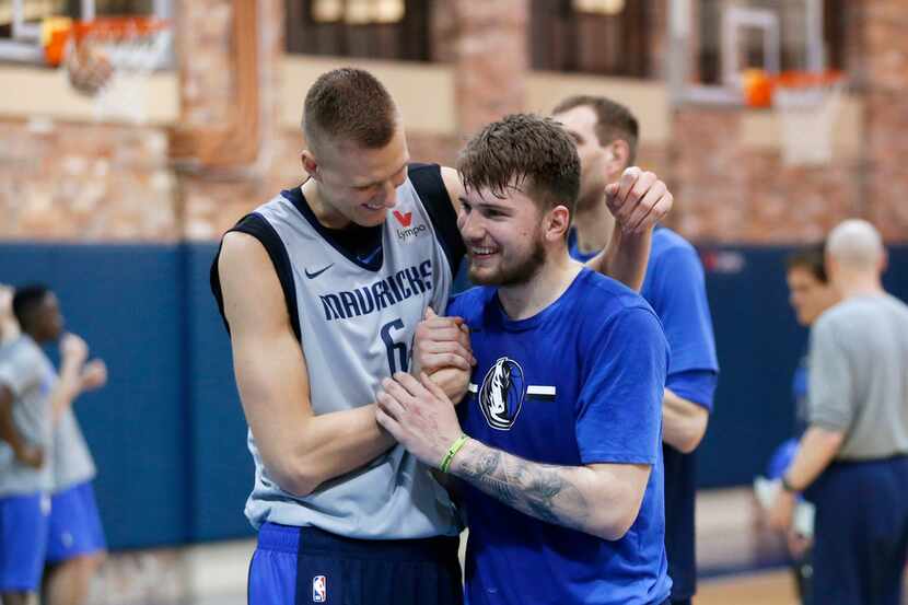 FILE - Dallas Mavericks forward Kristaps Porzingis (6) and Dallas Mavericks forward Luka...