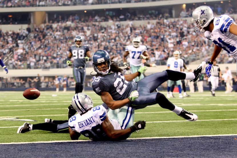 Dallas Cowboys wide receiver Dez Bryant (88) fumbles the ball near the goal line after a...