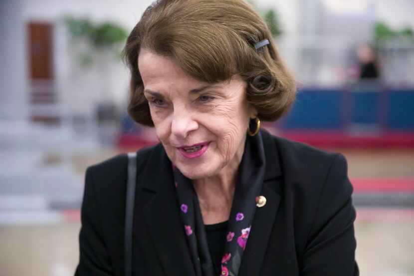 FILE - Sen. Dianne Feinstein, D-Calif., speaks with a reporter on Capitol Hill, Feb. 5, 2019...