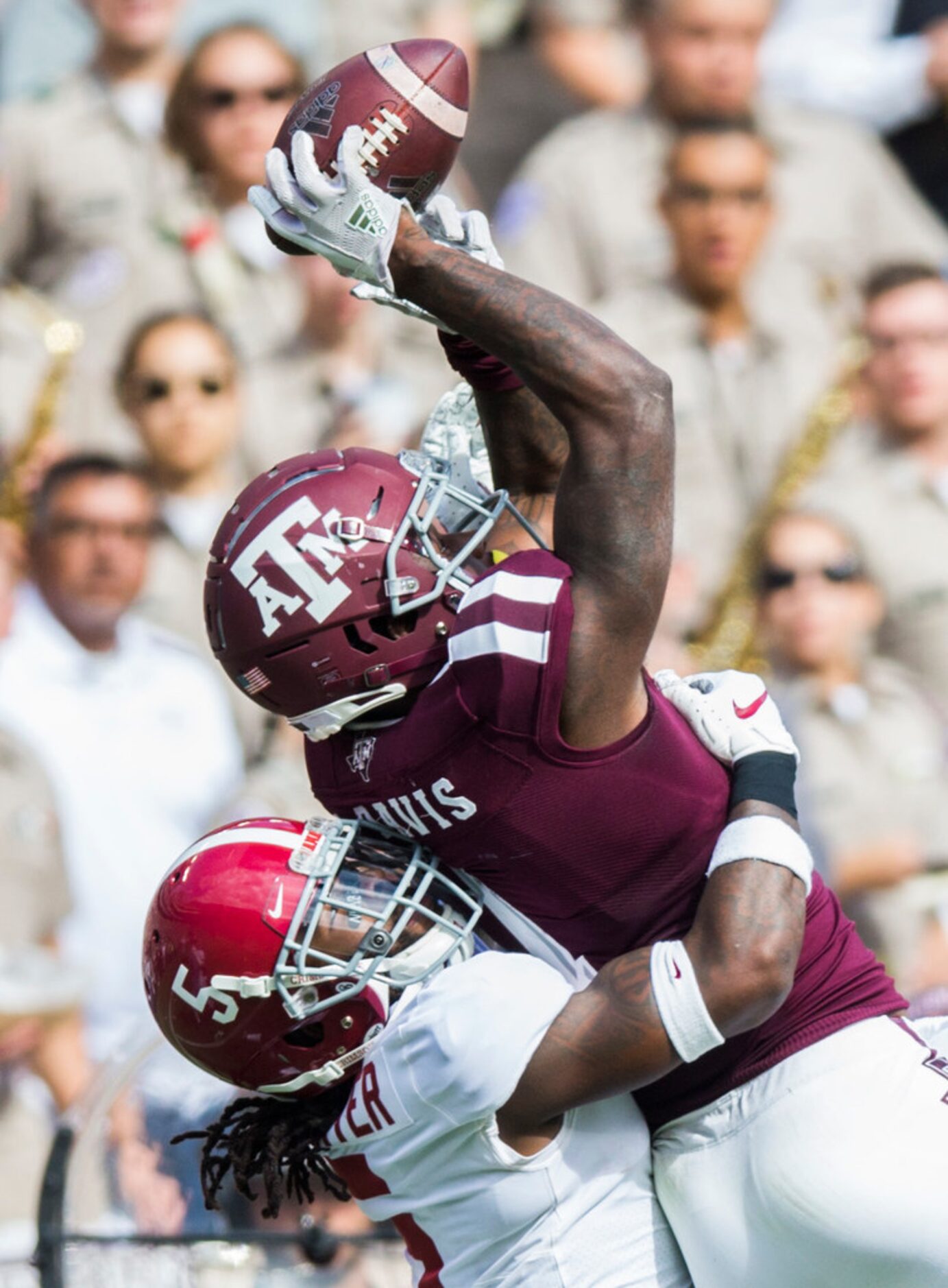 Texas A&M Aggies wide receiver Quartney Davis (1) catches a pass over Alabama Crimson Tide...