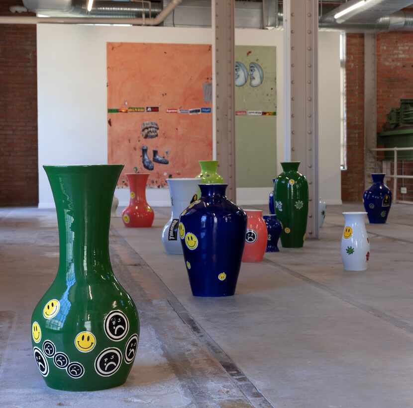 The Power Station's mezzanine — filled with ceramic vases — creates a dramatic second-floor...