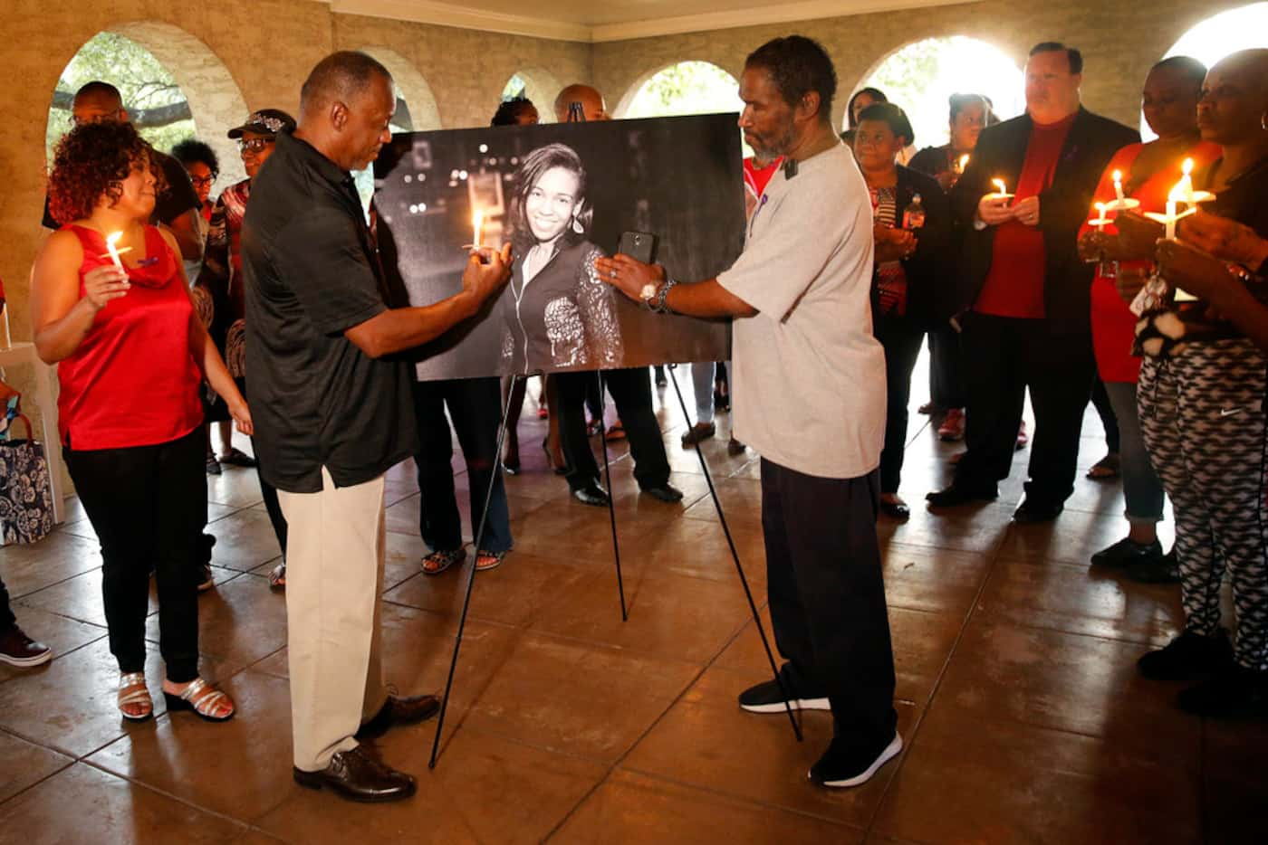 Donna Alexander's step father Larry Armour of Little Rock, Ark., (center, left) and father...