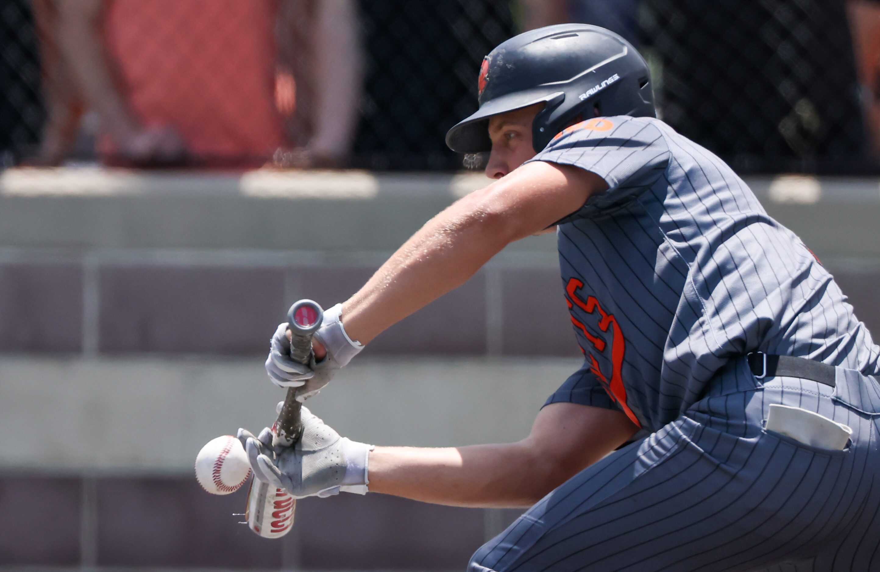 Rockwall senior Jack Jungels (7) makes a blunt hit during an area round game of the UIL...