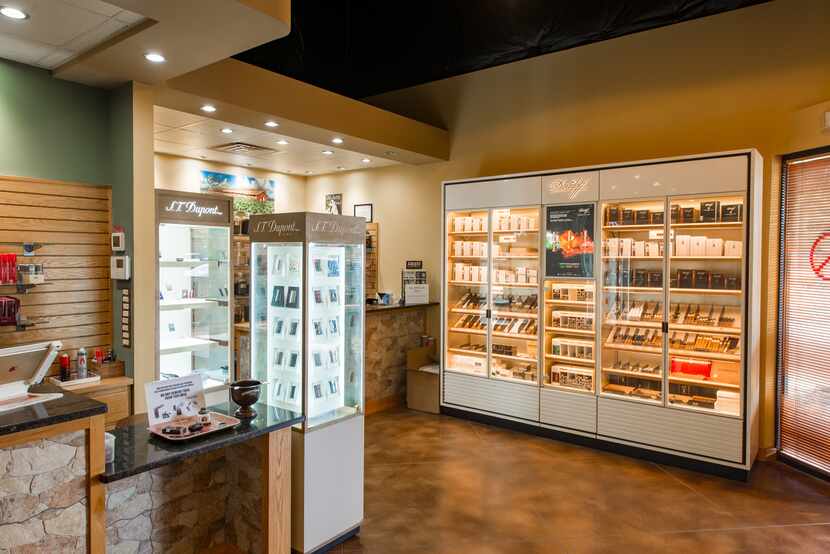 A photo of cigars in glass display cases at Renegade Cigars.