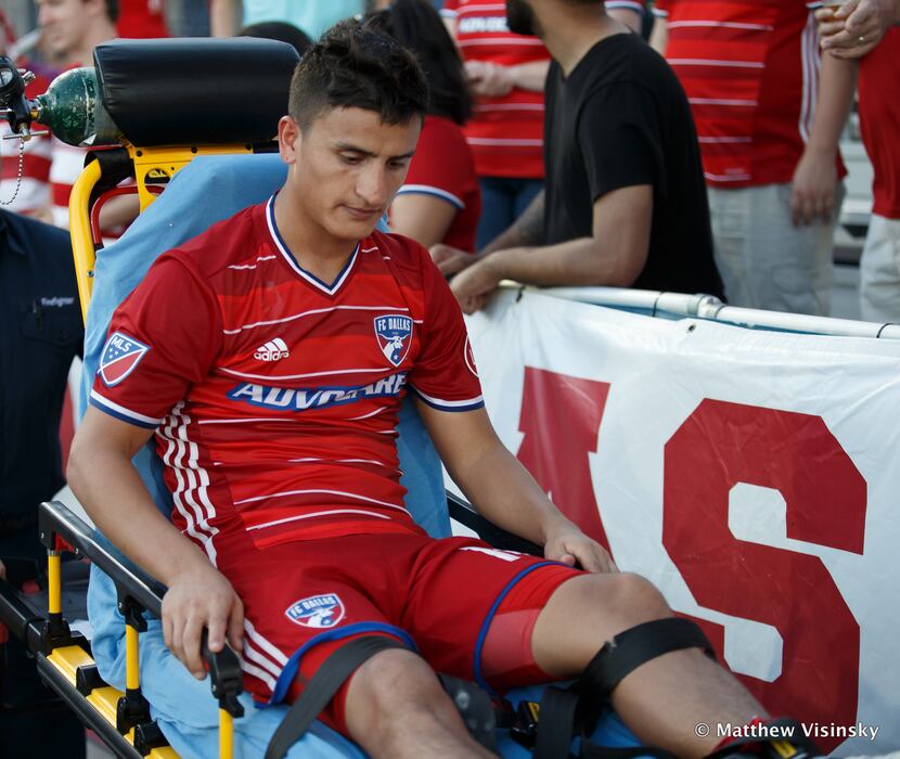 16 October 2016 - FC Dallas midfielder Mauro Diaz (#10) is wheeled off on a stretcher with...