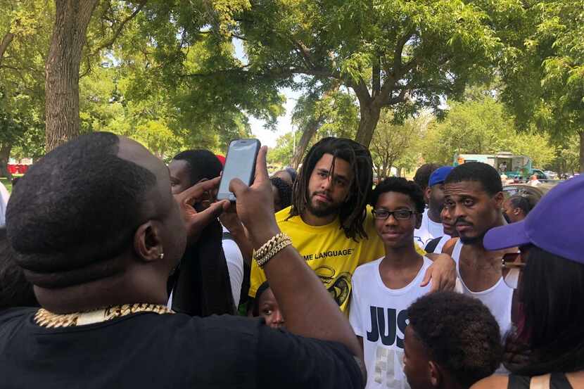 Rapper J.Cole surprises a small crowd at a back to school festival in Oak Cliff on Saturday,...