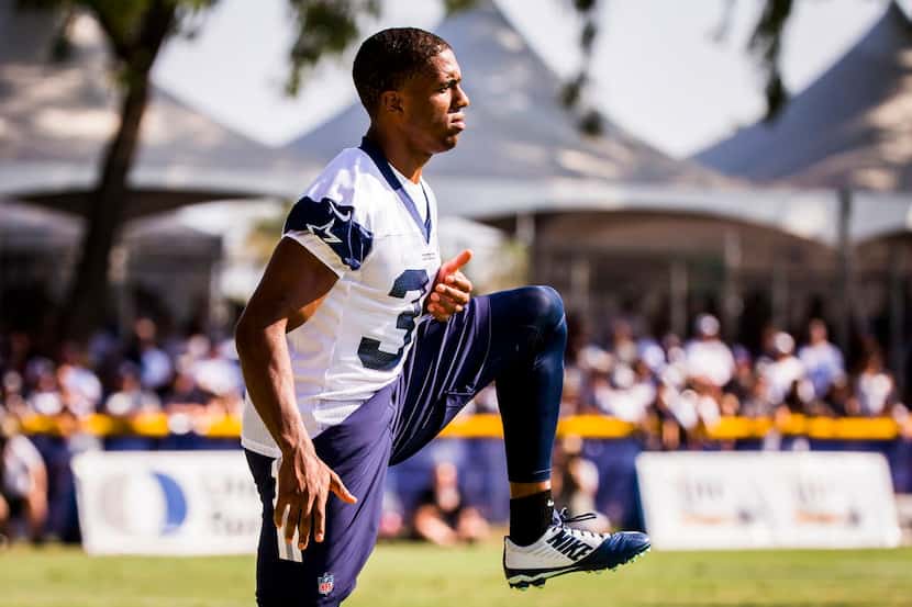 Dallas Cowboys rookie Byron Jones stretches during a joint practice with the St. Louis Rams...