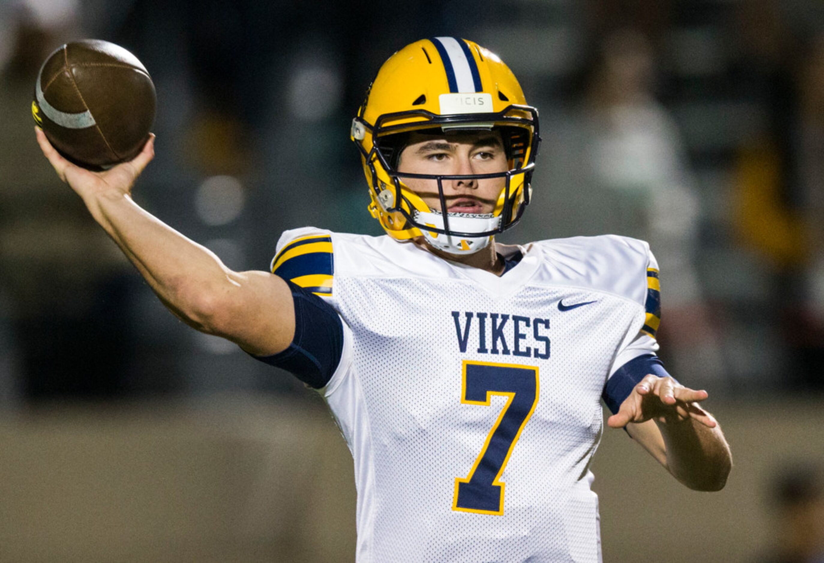 Arlington Lamar quarterback Jack Dawson (7) throws a pass during the first quarter of a UIL...