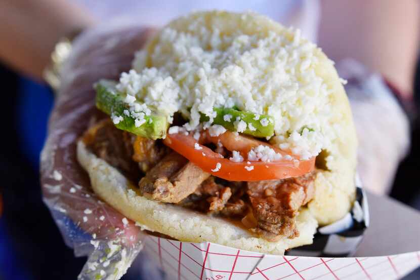 The Arepa Nation, with steak beef, tomato slices, avocado and white Paisa cheese, served at...