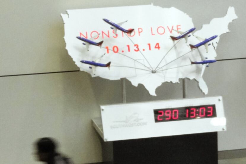 Southwest Airlines' digital clock counts down the days, hours and minutes until the Wright...