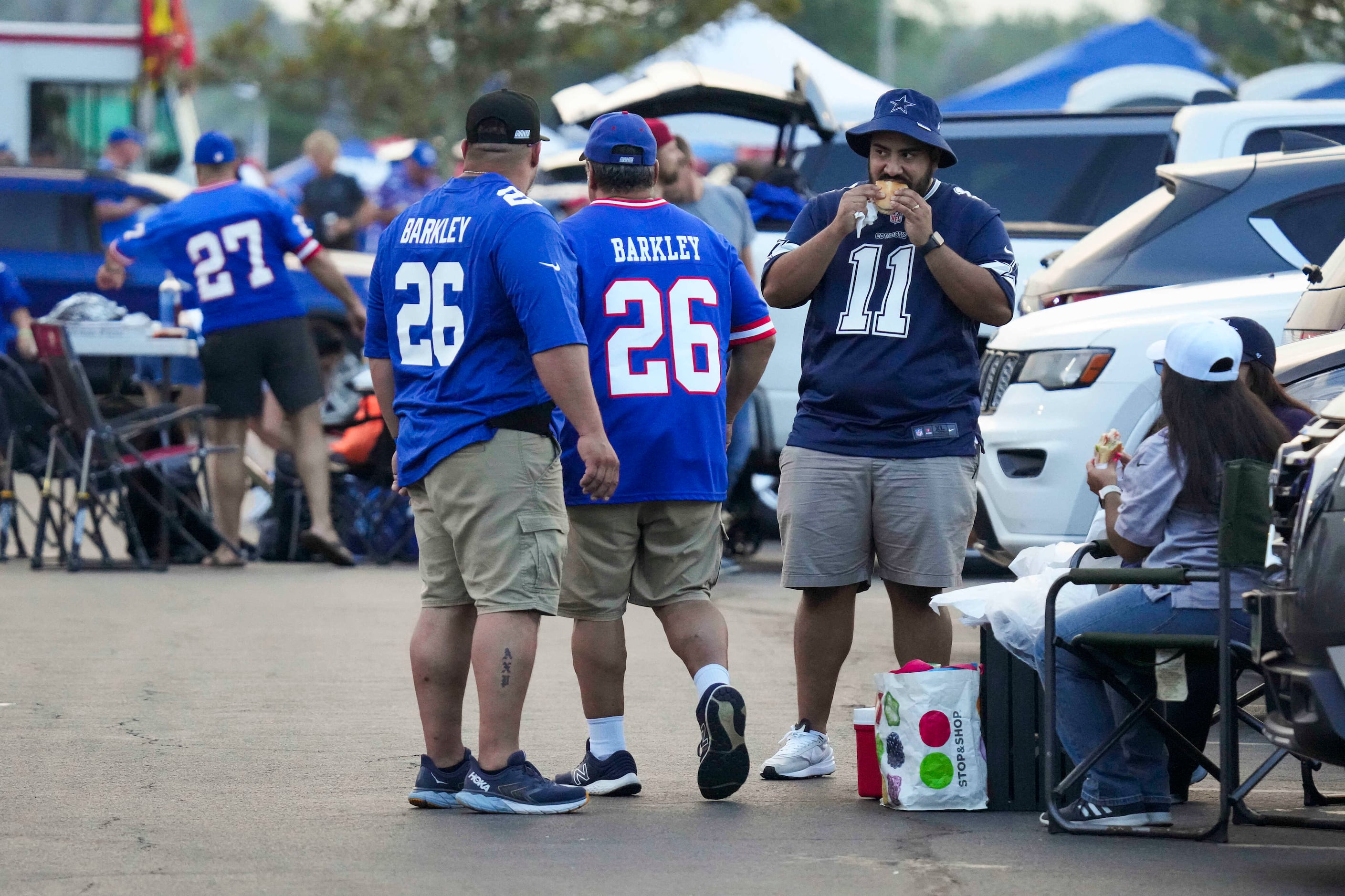 Dallas Cowboys defensive tackle Neville Gallimore (96) celebrates with fans  after an NFL football game against the New York Giants, Sunday, Dec. 19,  2021, in East Rutherford, N.J. The Dallas Cowboys defeated