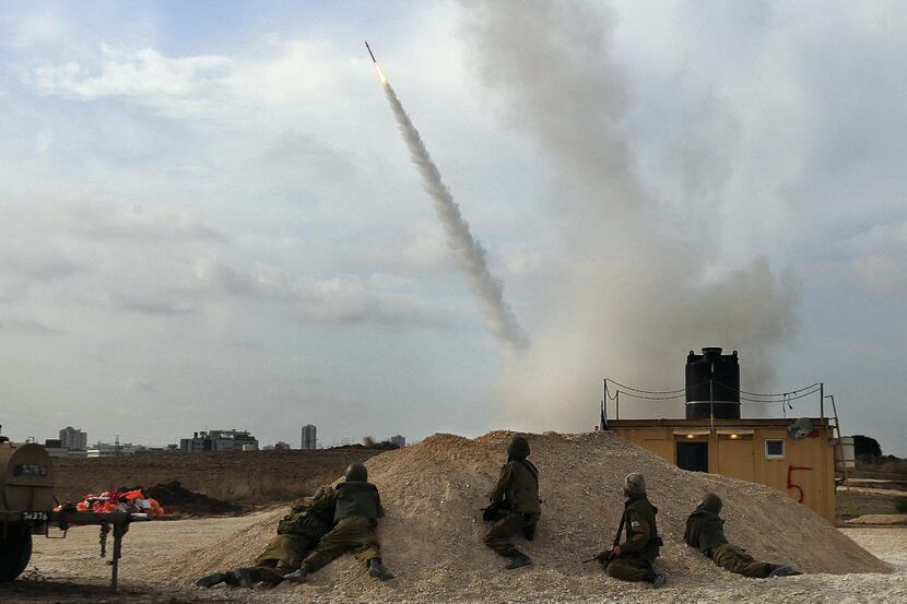 FILE -- A missile, part of Israel's Iron Dome defense shield, is launched from an...