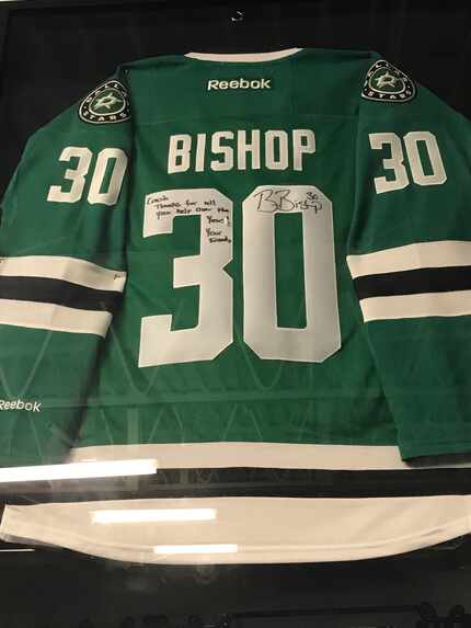 Stars' goalie Ben Bishop's jersey is framed at Elevated Performance in St. Louis. Etched on...