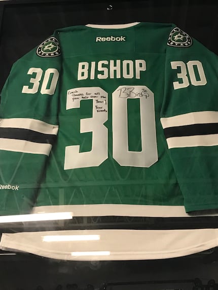Stars' goalie Ben Bishop's jersey is framed at Elevated Performance in St. Louis. Etched on...