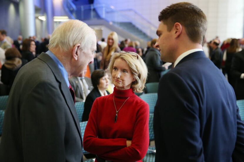 Texas state Rep. Jodie Laubenberg speaks with U.S. Rep. Sam Johnson (left) and Texas state...