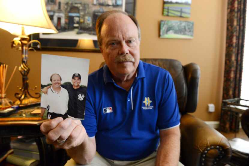 Donald Hooton of McKinney holds a photo of his son, Taylor Hooton who committed suicide in...