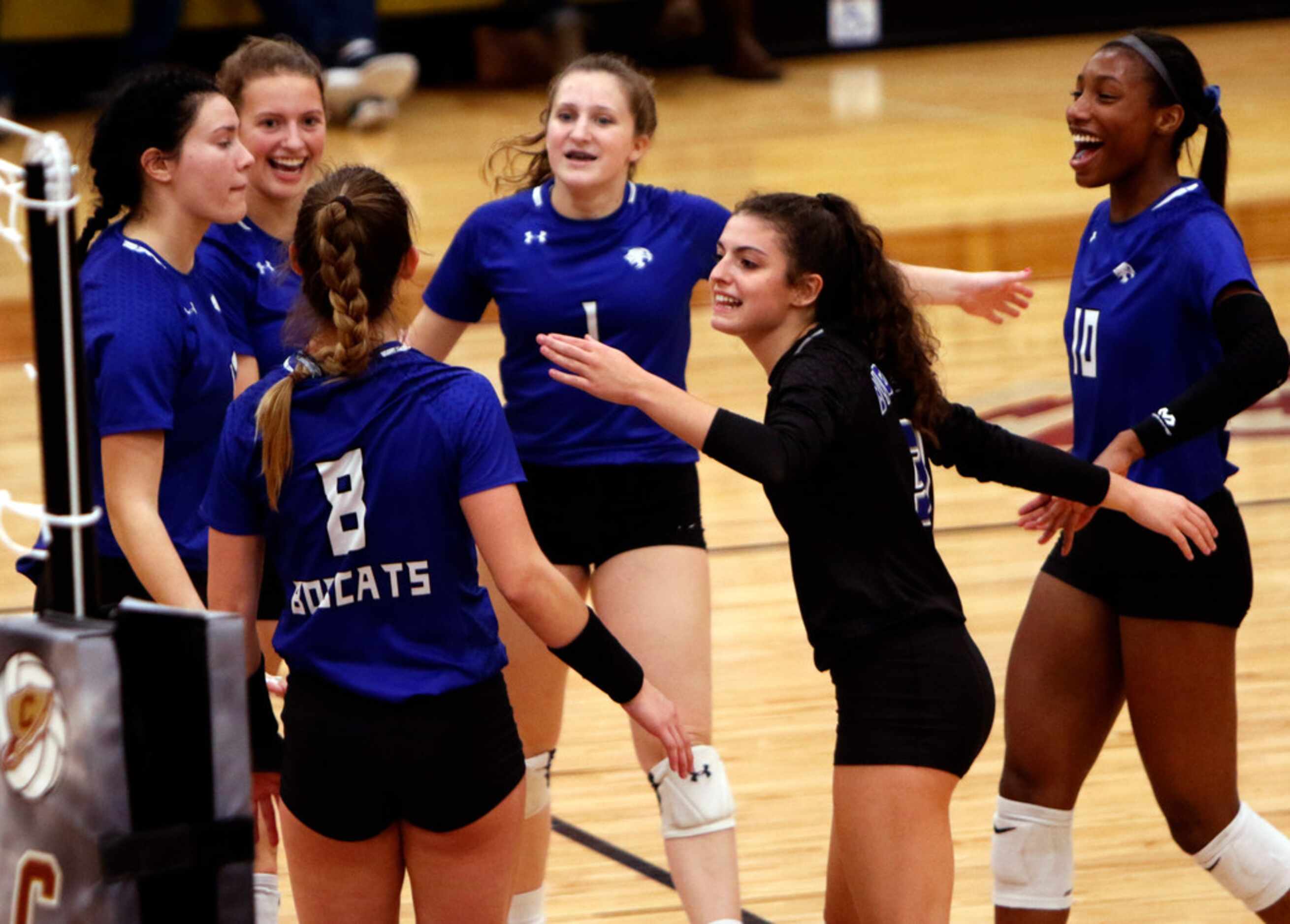 Trophy Club Byron Nelson outside hitter Paige Flicking (8) lights up the room (or at least...