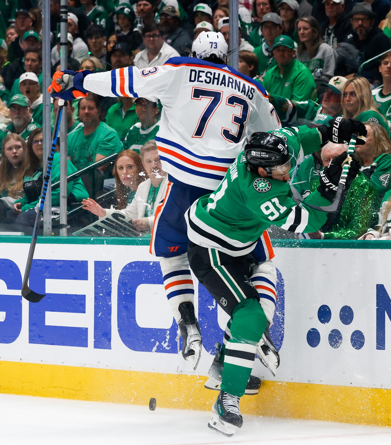 Edmonton Oilers defenseman Vincent Desharnais (73) collides with Dallas Stars center Tyler...