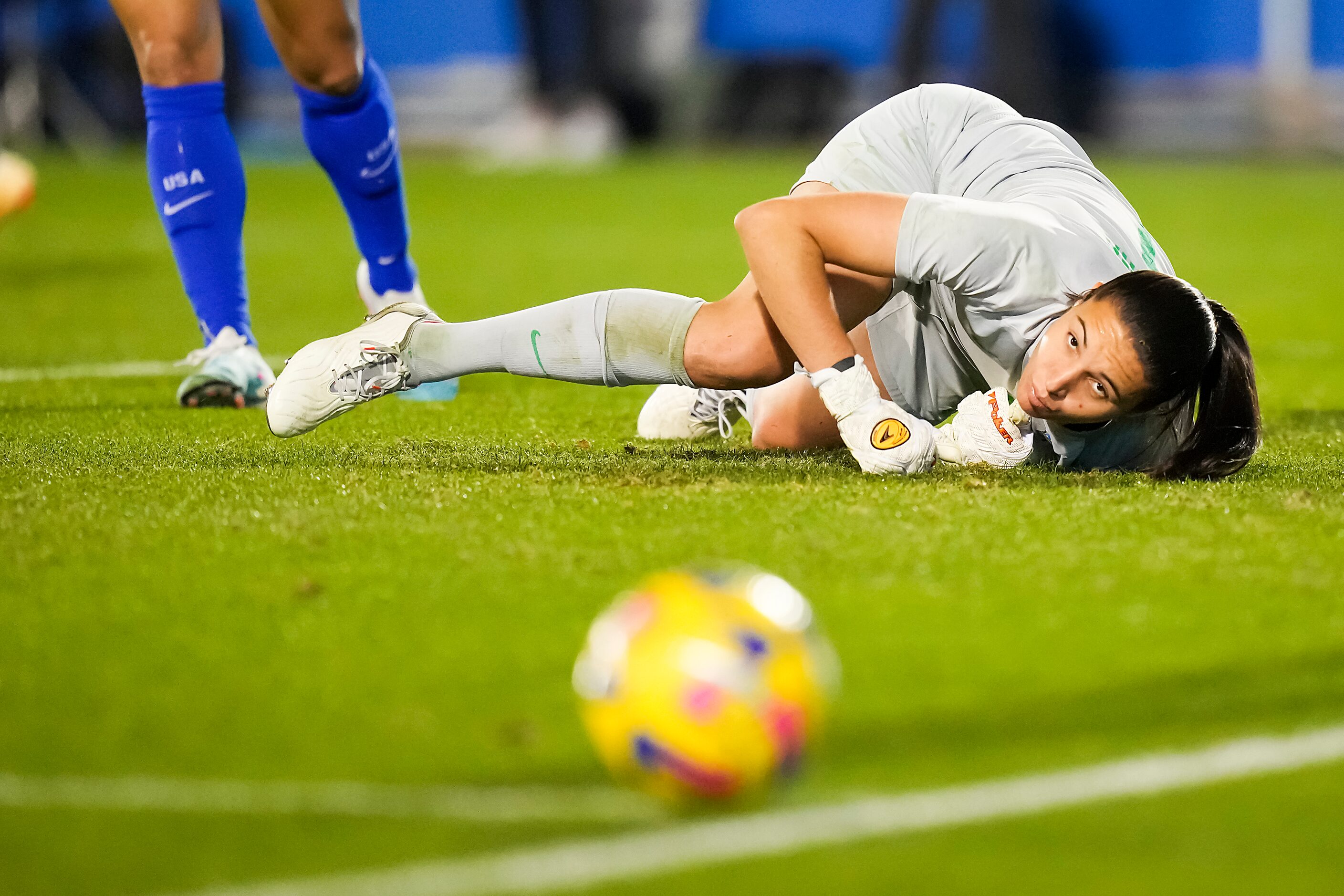 Brazil goalkeeper Lorena (1) watches as a shot by United States forward Megan Rapinoe sails...