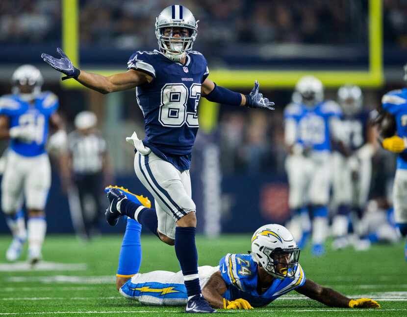 Dallas Cowboys wide receiver Terrance Williams (83) reacts to a pass interference call after...